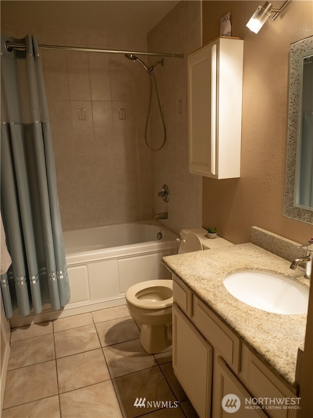 12840 SE 40th Ct Unit B12, Bellevue, WA 98006 - full bathroom featuring toilet, shower / bath combo with shower curtain, vanity, and tile patterned floors