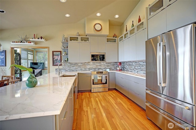 1351 Crestview Dr, Camano Island, WA 98282 - kitchen featuring stainless steel appliances, a sink, modern cabinets, a peninsula, and open shelves