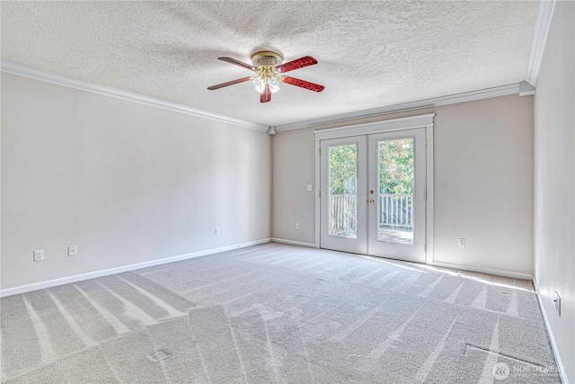 1718 6th St SE, East Wenatchee, WA 98802 - carpeted empty room with ceiling fan, french doors, ornamental molding, a textured ceiling, and baseboards