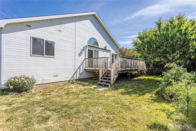 1718 6th St SE, East Wenatchee, WA 98802 - back of house with a wooden deck, stairs, and a lawn