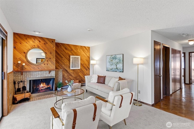 12840 SE 40th Ct Unit A4, Bellevue, WA 98006 - carpeted living room with a textured ceiling, a tile fireplace, wood walls, and baseboards