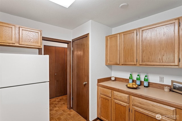 12840 SE 40th Ct Unit A4, Bellevue, WA 98006 - kitchen with freestanding refrigerator and light countertops