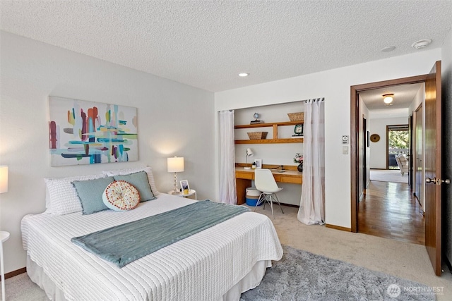 12840 SE 40th Ct Unit A4, Bellevue, WA 98006 - carpeted bedroom with a textured ceiling and baseboards