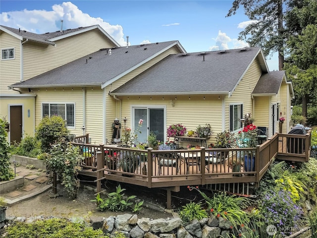 6511 127th Street Ct E Unit 19, Puyallup, WA 98373 - rear view of house featuring a shingled roof and a deck