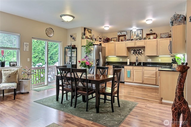 6511 127th Street Ct E Unit 19, Puyallup, WA 98373 - dining room featuring light wood-style flooring