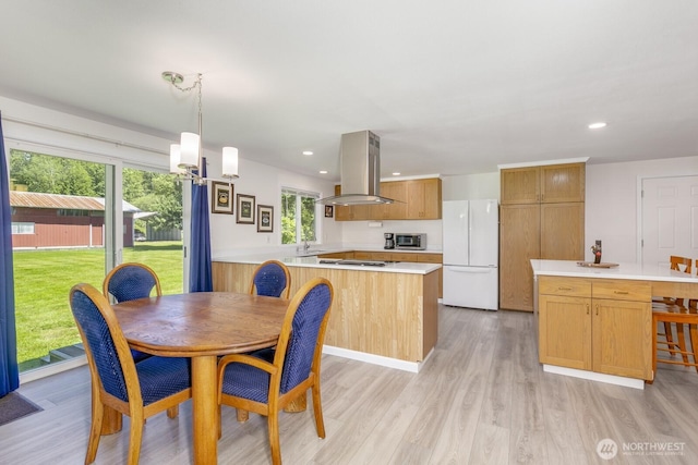 21709 Jordan Rd, Arlington, WA 98223 - dining room with light wood finished floors and recessed lighting