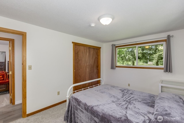 21709 Jordan Rd, Arlington, WA 98223 - bedroom featuring carpet, baseboards, and a closet