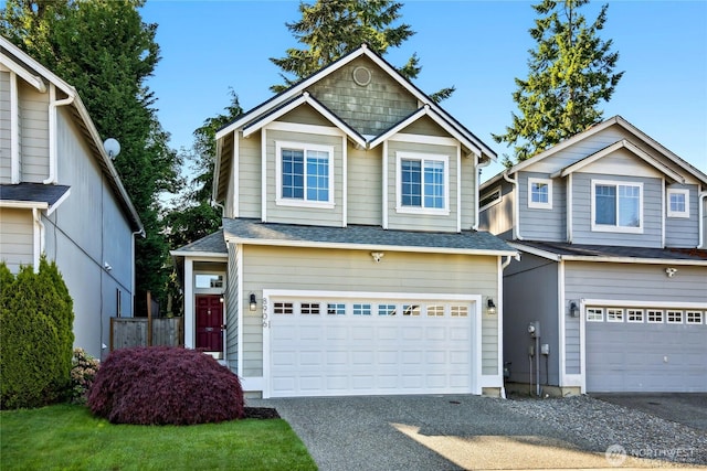 8906 161st St E, Puyallup, WA 98375 - view of front of property with a garage, asphalt driveway, and a shingled roof
