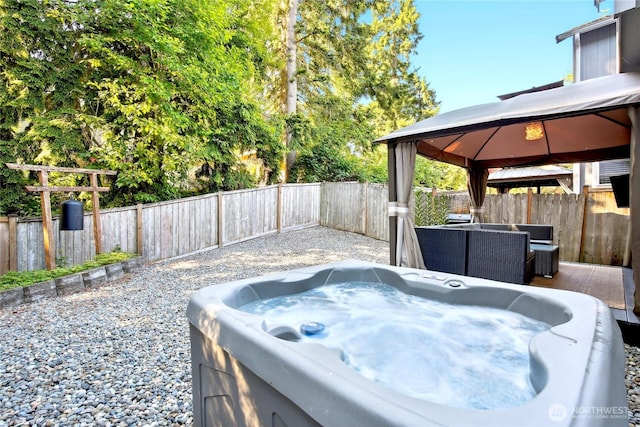 8906 161st St E, Puyallup, WA 98375 - fenced backyard with a gazebo and a hot tub
