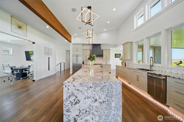 126 Red Hawk Rd, Walla Walla, WA 99362 - kitchen with stainless steel appliances, a sink, a kitchen island, backsplash, and light stone counters