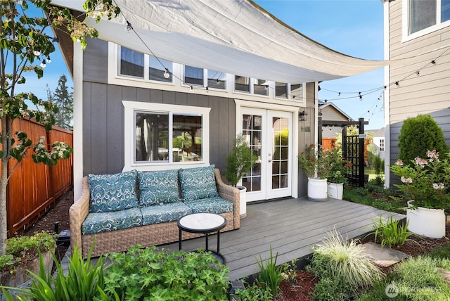 10713 Palisades St SE, Yelm, WA 98597 - wooden deck featuring french doors and an outdoor hangout area