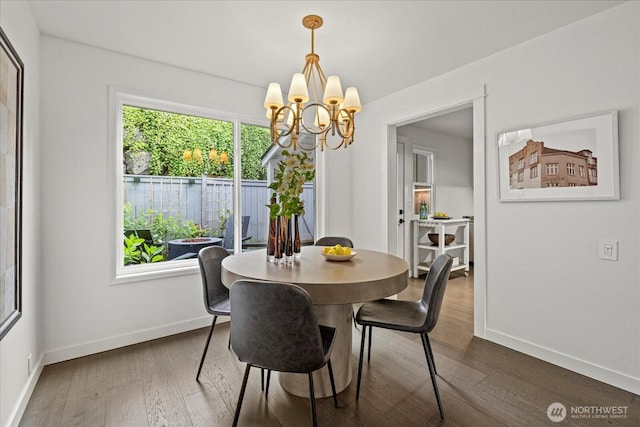 1420 Bellevue Way SE Unit 14, Bellevue, WA 98004 - dining space featuring dark wood-style floors, a chandelier, and baseboards