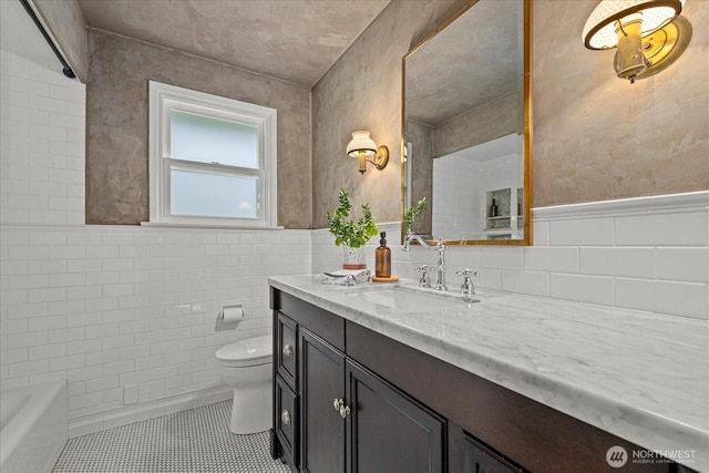 1420 Bellevue Way SE Unit 14, Bellevue, WA 98004 - full bathroom featuring vanity, toilet, a tub, tile patterned floors, and tile walls