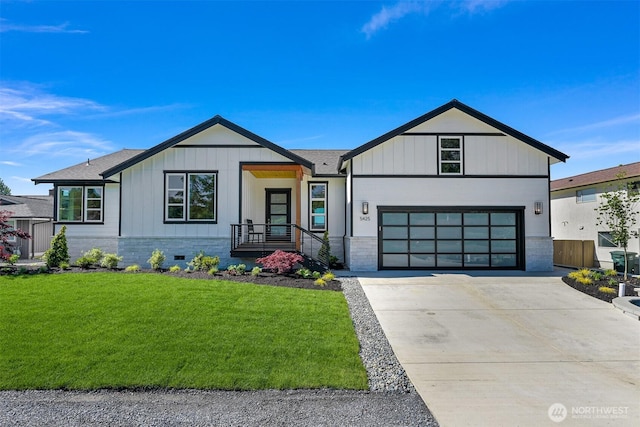 5425 Salish Rd, Blaine, WA 98230 - modern inspired farmhouse with a front yard, concrete driveway, board and batten siding, and roof with shingles