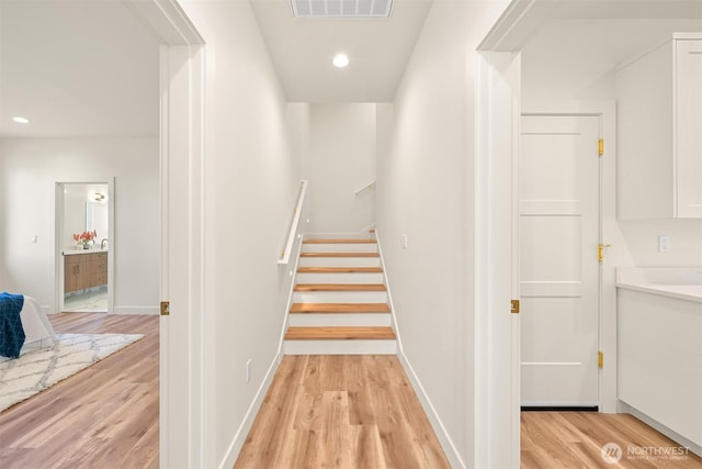 5425 Salish Rd, Blaine, WA 98230 - stairs with wood finished floors, recessed lighting, and baseboards