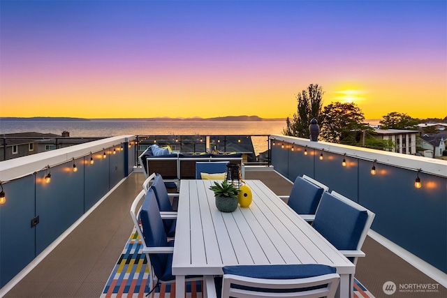 3852 Beach Dr SW Unit A, Seattle, WA 98116 - view of balcony at dusk