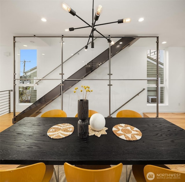 3852 Beach Dr SW Unit A, Seattle, WA 98116 - dining space with wood finished floors, healthy amount of natural light, and recessed lighting