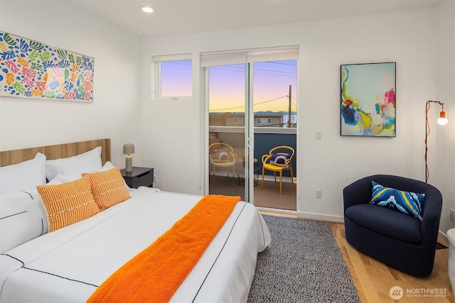 3852 Beach Dr SW Unit A, Seattle, WA 98116 - bedroom featuring wood finished floors, a closet, and recessed lighting