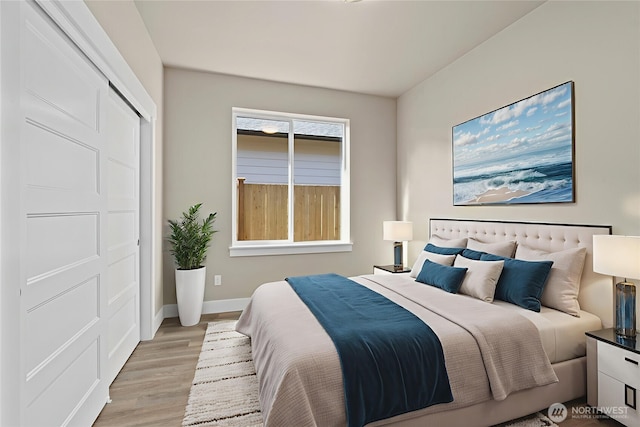2114 Hawks View Ln, Winlock, WA 98596 - bedroom with light wood-style floors and baseboards