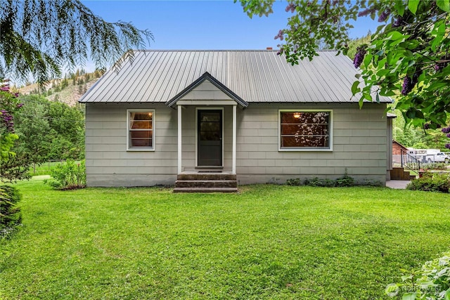 1361 Mission Creek Rd, Cashmere, WA 98815 - bungalow-style house featuring a front yard and metal roof