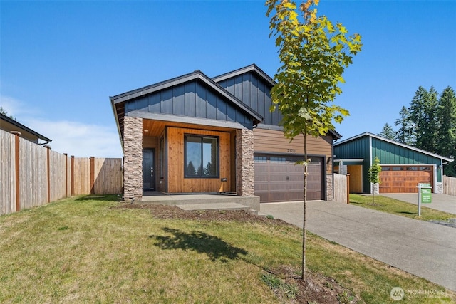 2120 Hawks View Ln, Winlock, WA 98596 - view of front of property featuring board and batten siding, stone siding, and concrete driveway