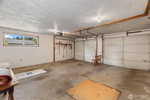 702 Cushing St SW, Olympia, WA 98502 - garage featuring a garage door opener