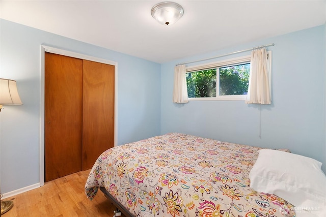 702 Cushing St SW, Olympia, WA 98502 - bedroom with light wood-style floors and a closet