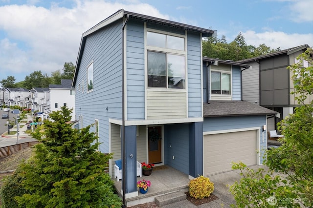 8223 31st Street Ct E, Edgewood, WA 98371 - view of front of home with a garage