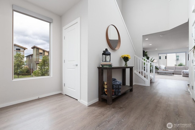 8223 31st Street Ct E, Edgewood, WA 98371 - foyer entrance with stairs, wood finished floors, baseboards, and recessed lighting