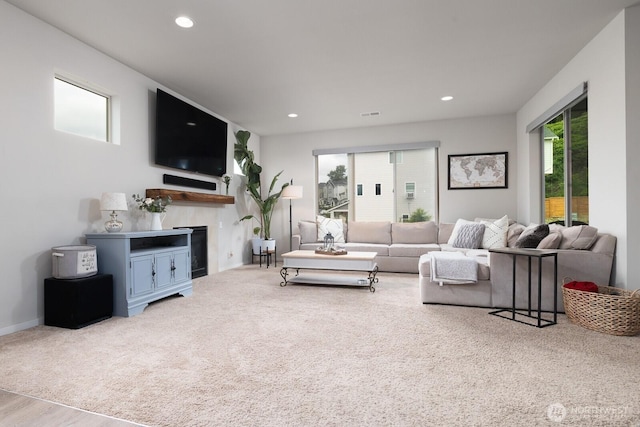 8223 31st Street Ct E, Edgewood, WA 98371 - living room featuring a fireplace, recessed lighting, and carpet flooring