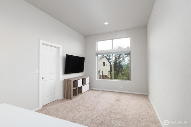 8223 31st Street Ct E, Edgewood, WA 98371 - unfurnished living room featuring carpet flooring and baseboards