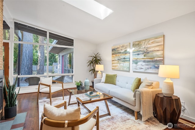 2342 N 120th St, Seattle, WA 98133 - living room with wood finished floors and a skylight