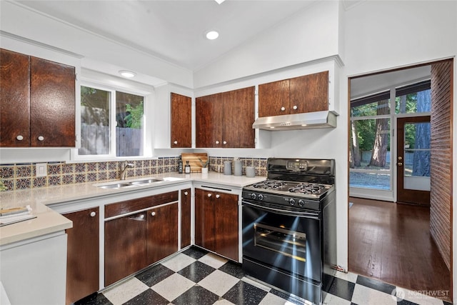 2342 N 120th St, Seattle, WA 98133 - kitchen with gas stove, range hood, a sink, dark floors, and light countertops