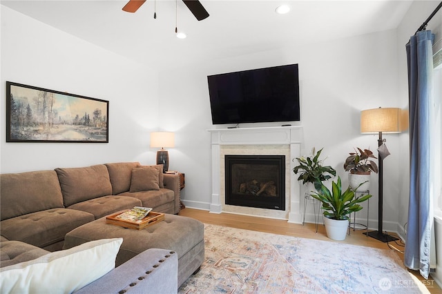 7118 Ashdown Ln SE, Olympia, WA 98513 - living room featuring a ceiling fan, wood finished floors, a high end fireplace, recessed lighting, and baseboards