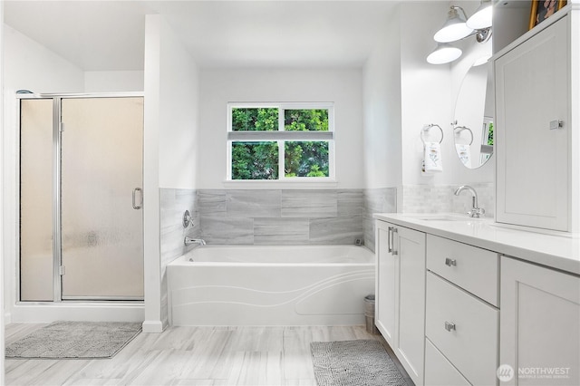 7118 Ashdown Ln SE, Olympia, WA 98513 - full bathroom featuring a shower stall, a bath, and vanity