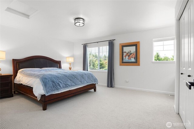7118 Ashdown Ln SE, Olympia, WA 98513 - carpeted bedroom featuring baseboards and attic access