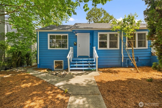 1704 27th Ave, Seattle, WA 98122 - view of front of house with a shingled roof