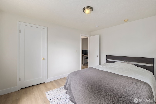 1704 27th Ave, Seattle, WA 98122 - bedroom with light wood finished floors and baseboards