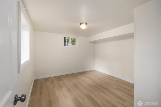 1704 27th Ave, Seattle, WA 98122 - empty room with light wood finished floors and baseboards