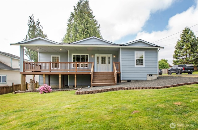 514 Mckinley Ave, Raymond, WA 98577 - rear view of property with a yard and a wooden deck