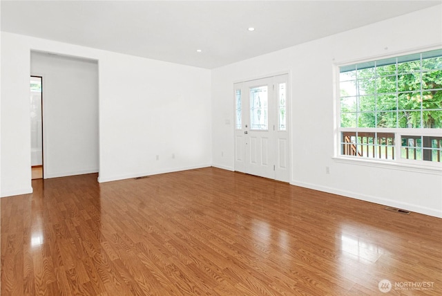 514 Mckinley Ave, Raymond, WA 98577 - spare room featuring wood finished floors, baseboards, and recessed lighting