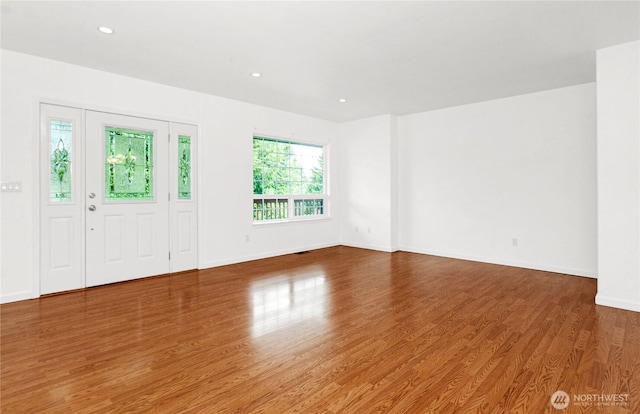 514 Mckinley Ave, Raymond, WA 98577 - unfurnished room featuring wood finished floors, baseboards, and recessed lighting