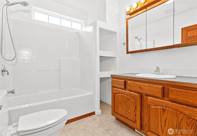 514 Mckinley Ave, Raymond, WA 98577 - bathroom with vanity, shower / bath combination, toilet, and tile patterned floors