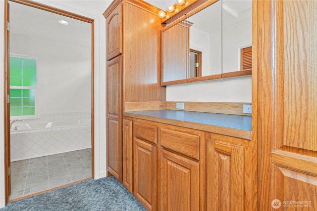 514 Mckinley Ave, Raymond, WA 98577 - full bathroom with vanity and a relaxing tiled tub