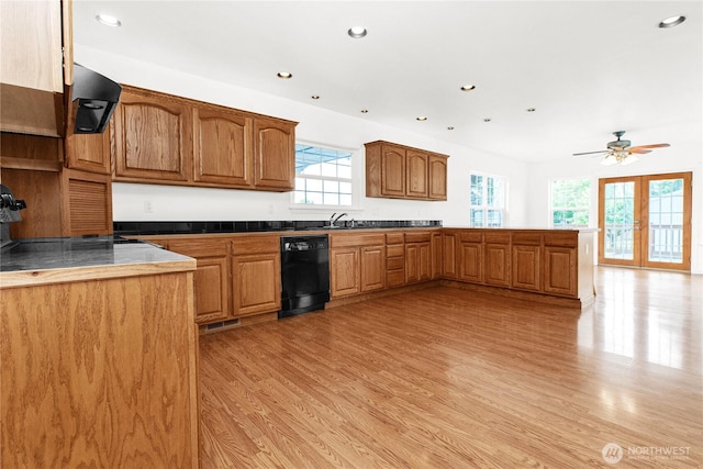 514 Mckinley Ave, Raymond, WA 98577 - kitchen featuring dishwasher, light wood-style flooring, a peninsula, recessed lighting, and a sink