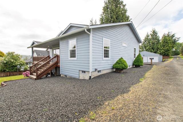 514 Mckinley Ave, Raymond, WA 98577 - view of side of property featuring stairway and an outdoor structure