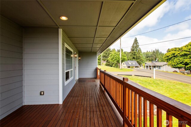 514 Mckinley Ave, Raymond, WA 98577 - wooden deck with a yard