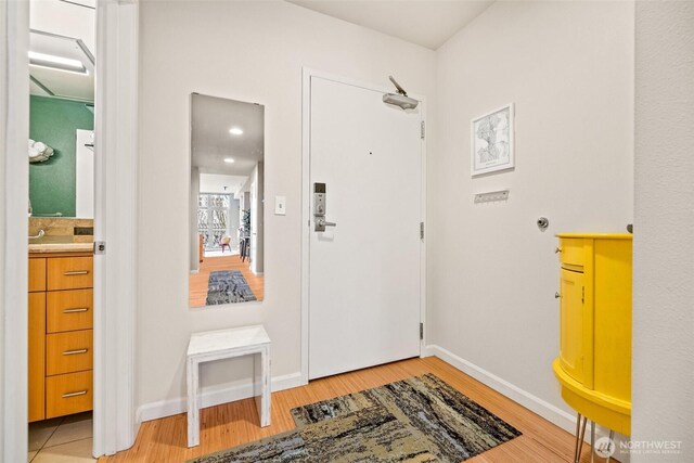 17 W Mercer St Unit 206, Seattle, WA 98119 - entryway with light wood-style floors and baseboards