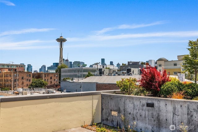 17 W Mercer St Unit 206, Seattle, WA 98119 - view of patio / terrace with a skyline view
