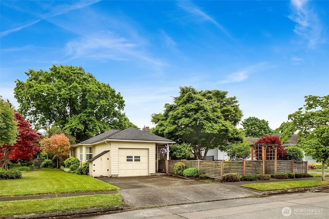 2708 Lynn St, Bellingham, WA 98225 - view of front of home featuring driveway, an attached garage, a chimney, and roof with shingles